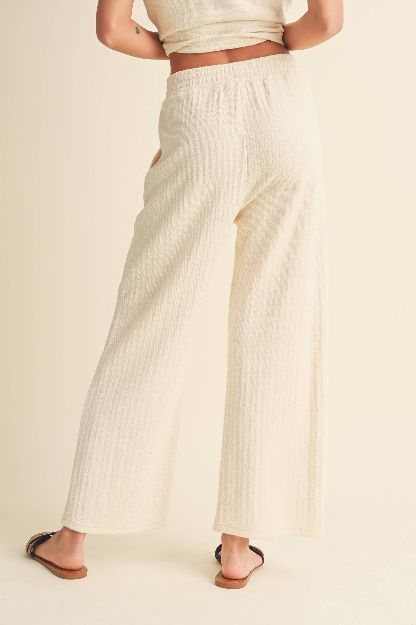 TEXTURED STRIPE KNITTED PANTS