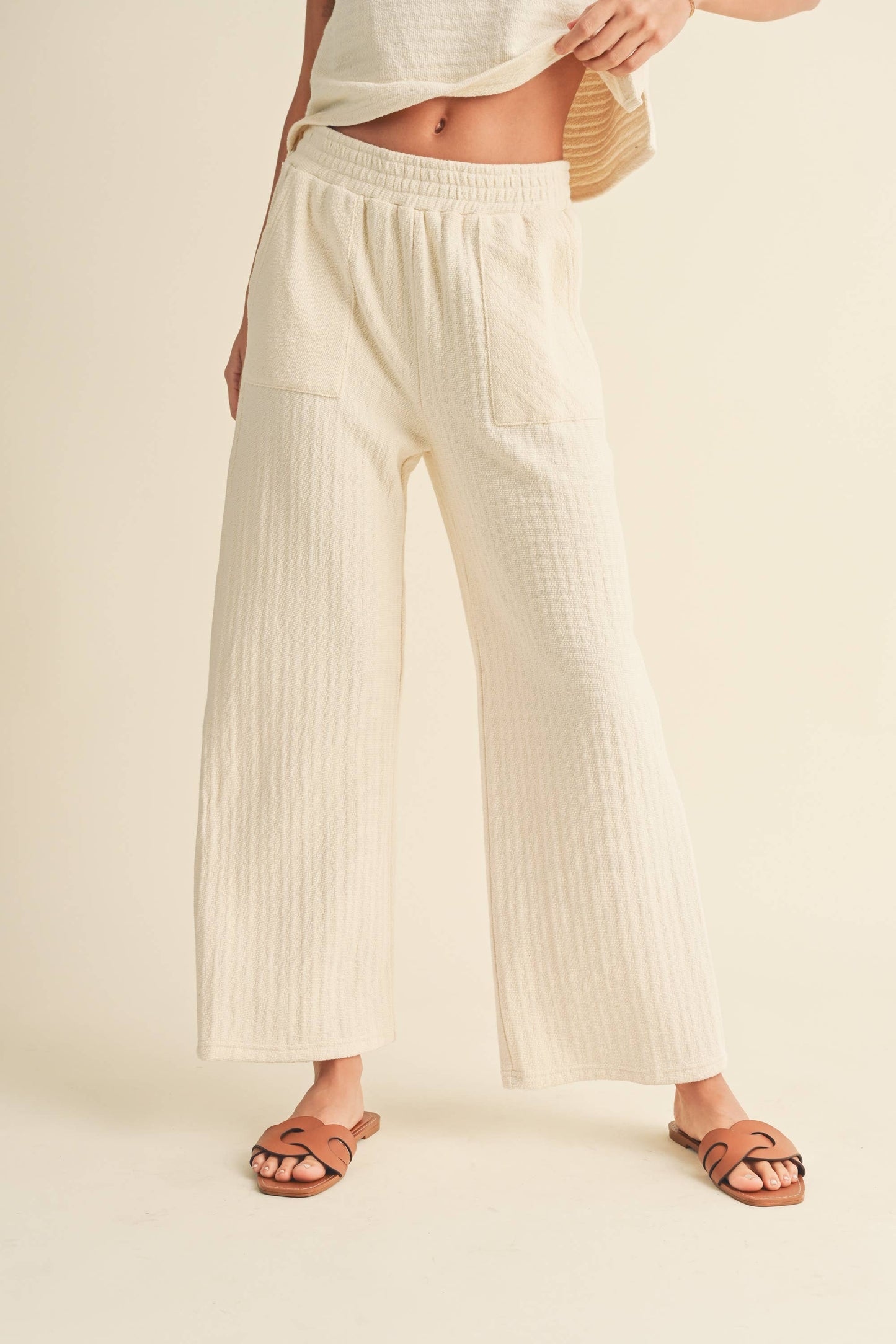 TEXTURED STRIPE KNITTED PANTS