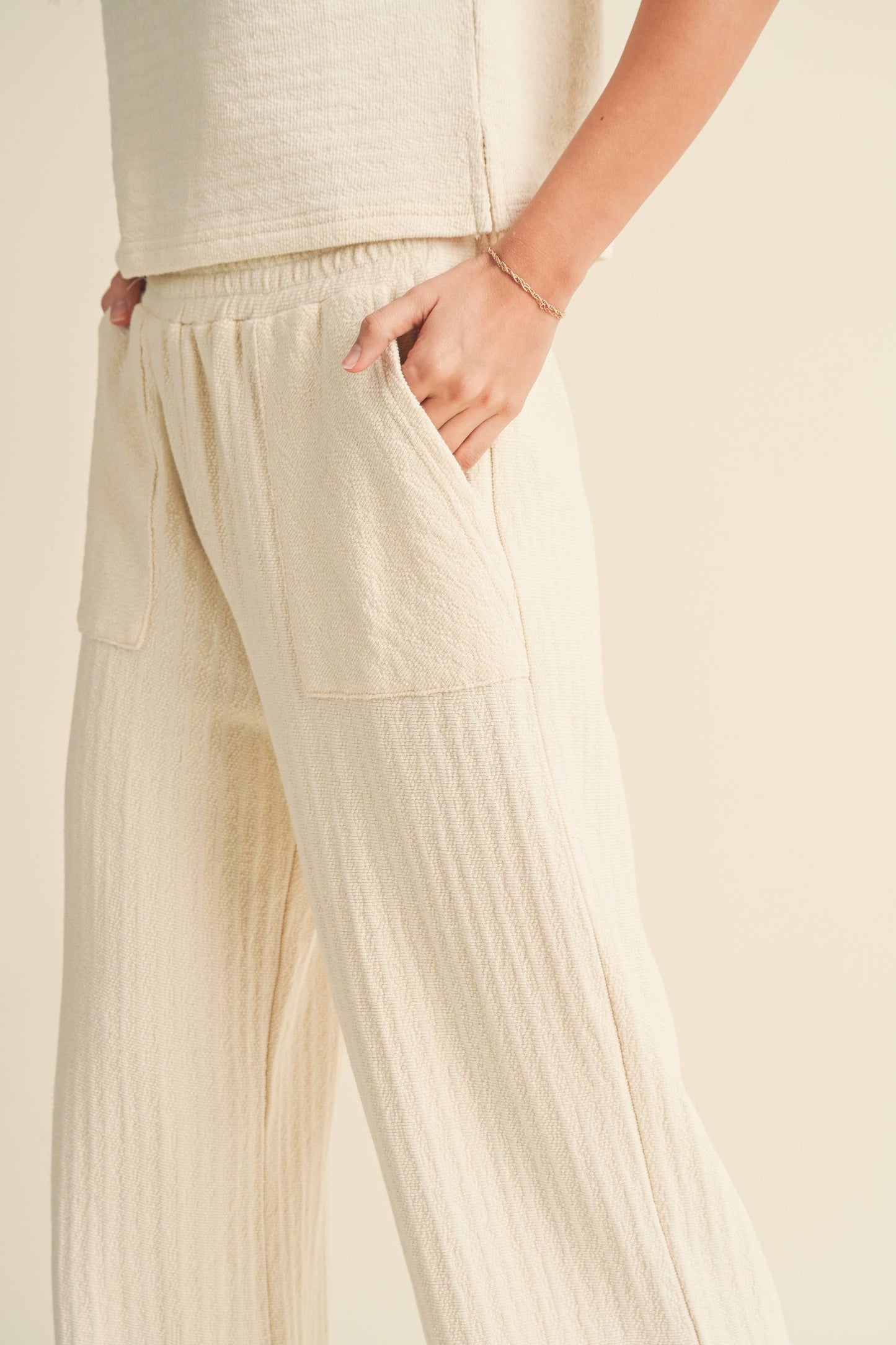 TEXTURED STRIPE KNITTED PANTS